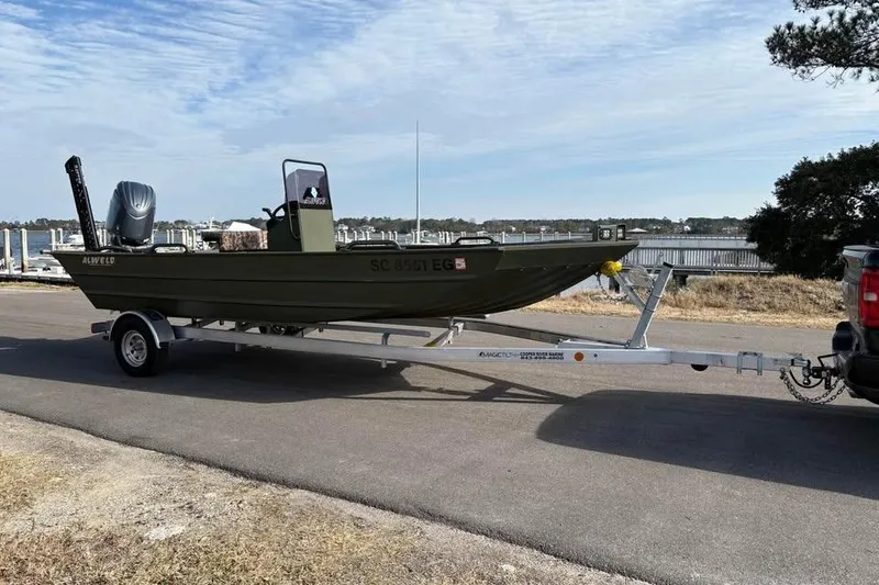 Slide: The Image of 2025 Alweld 2070VVCC Bay Boat on trailer by waterfront. - 5