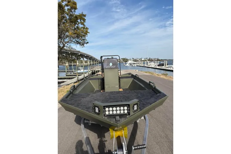 Slide: The Image of 2025 Alweld 2070VVCC Bay Boat on trailer by waterfront dock. - 6