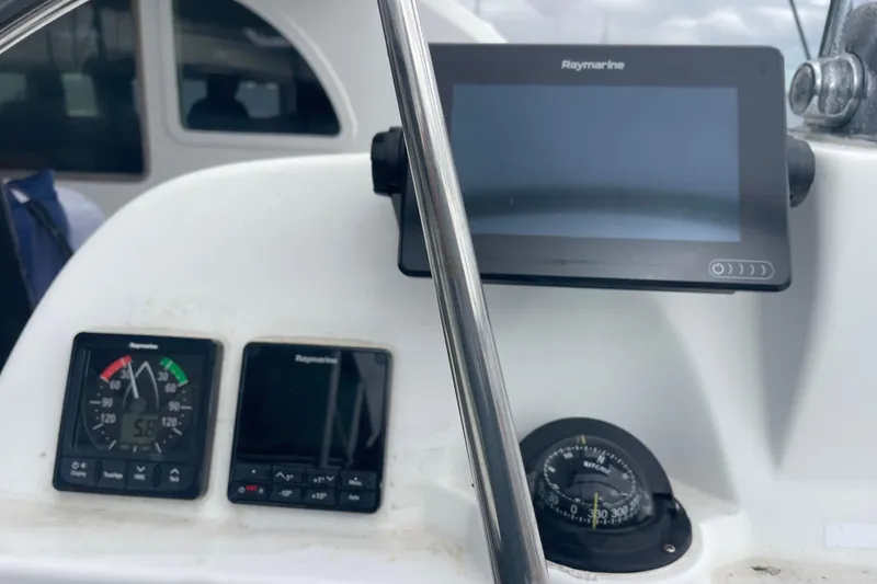 Slide: The Image of Control panel of a 2004 Lagoon 570 yacht with Raymarine instruments. - 16