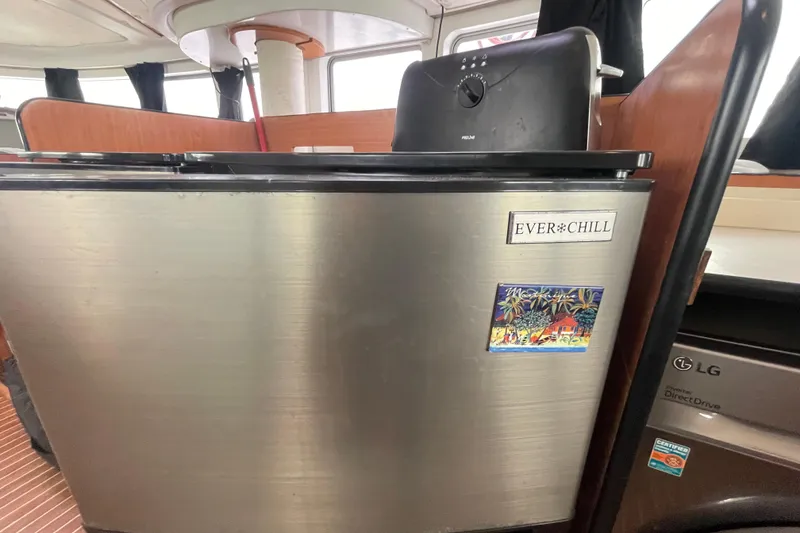 Slide: The Image of Stainless steel Everchill fridge in 2004 Lagoon 570 yacht interior. - 53