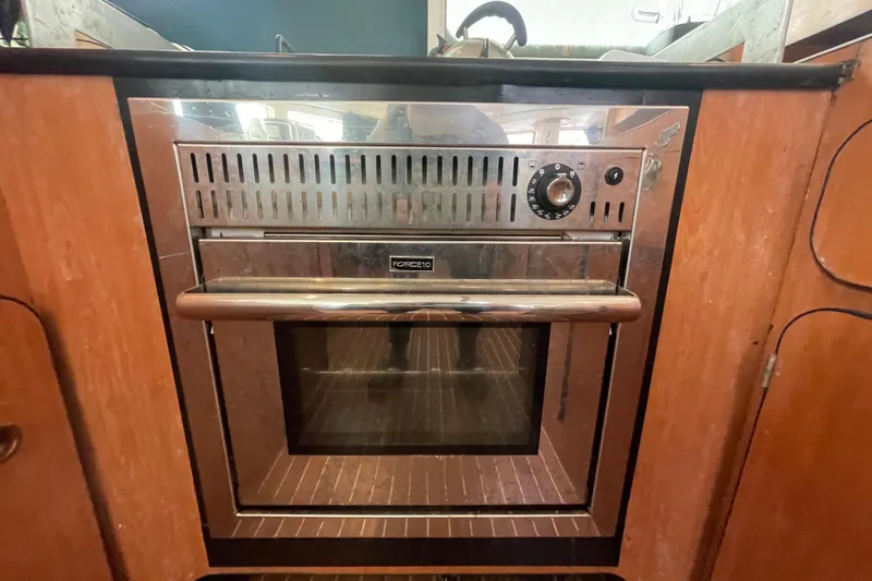 Slide: The Image of Stainless steel oven in 2004 Lagoon 570 yacht kitchen interior. - 55