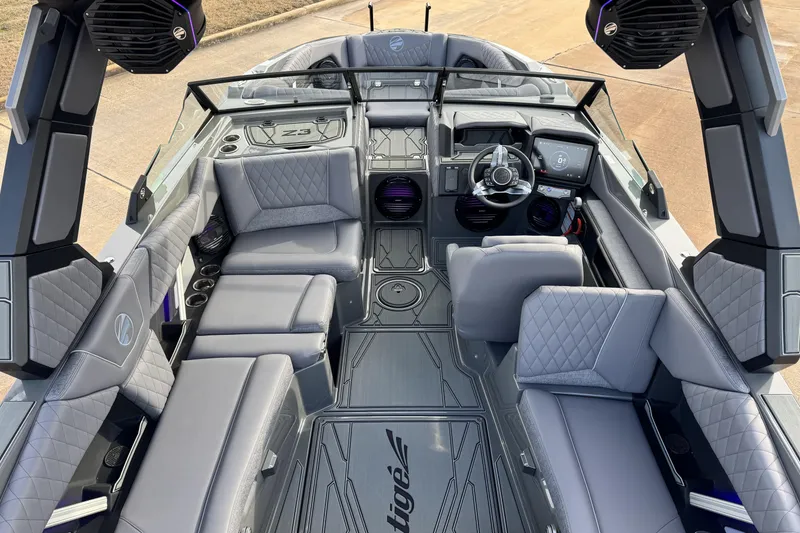 Slide: The Image of 2026 Tigé Z3 boat interior with luxurious seating and advanced dashboard features. - 11