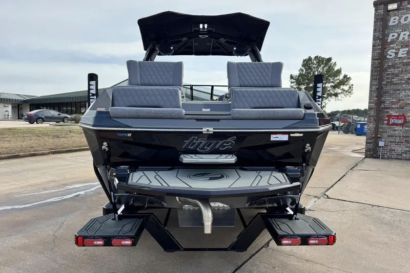 Slide: The Image of 2026 Tigé Z3 boat rear view with sleek design and modern features. - 4