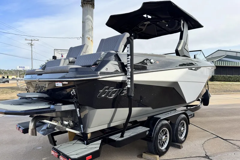 Slide: The Image of 2026 Tigé Z3 boat on trailer, sleek design, parked outdoors. - 5