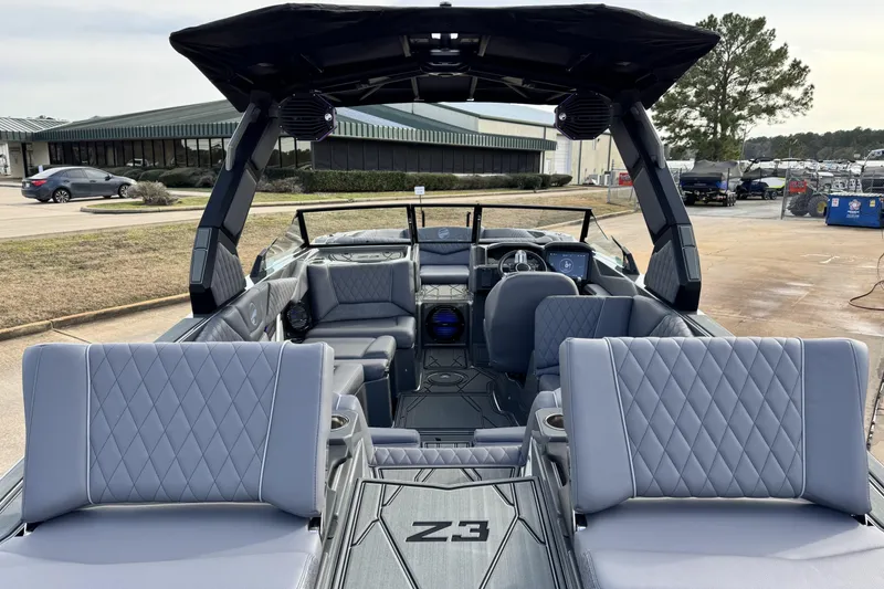 Slide: The Image of 2026 Tigé Z3 boat interior with luxurious seating and modern design. - 9
