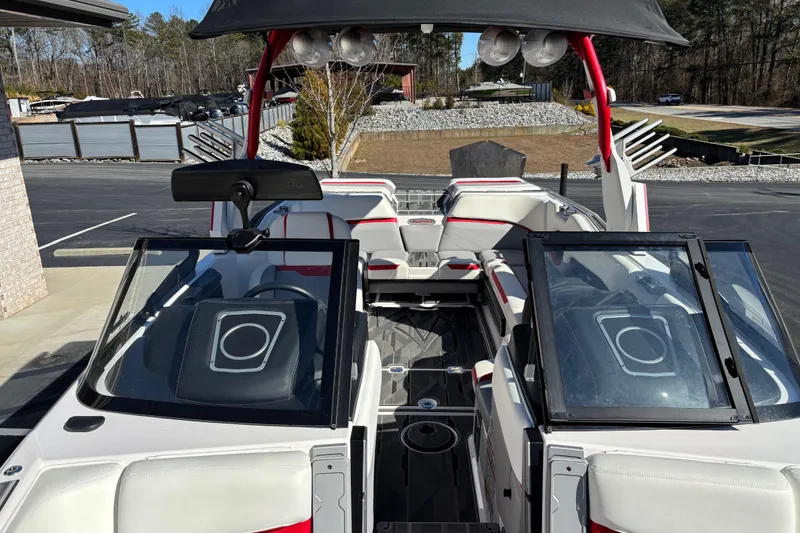 Slide: The Image of 2022 Supra SL 400 boat interior with red accents and modern design features. - 5