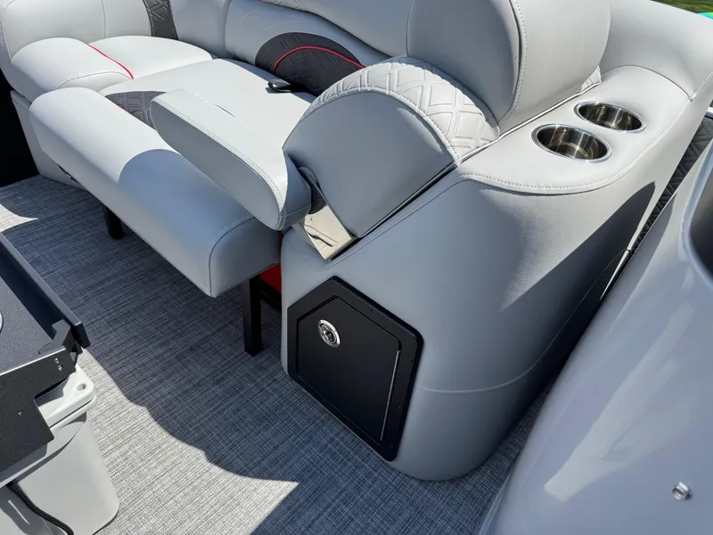 Slide: The Image of Luxurious seating on 2026 JC SportToon 24 TT DSL pontoon boat with cup holders and storage. - 10