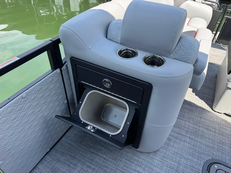 Slide: The Image of Luxurious seating with cup holders and storage on 2026 JC SportToon 24 TT DSL boat. - 9