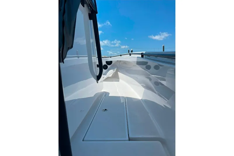 Slide: The Image of 2024 Onslow Bay 33 Tournament boat deck under clear blue sky. - 10