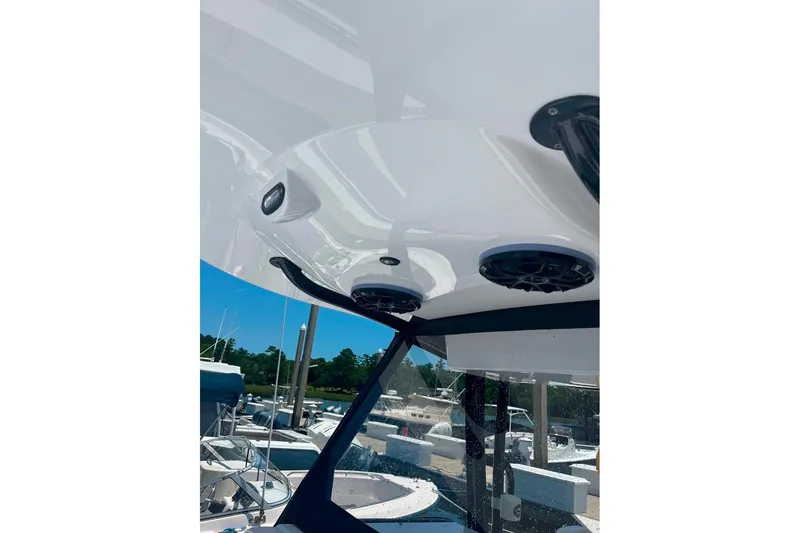Slide: The Image of 2024 Onslow Bay 33 Tournament boat speakers and canopy detail. - 14