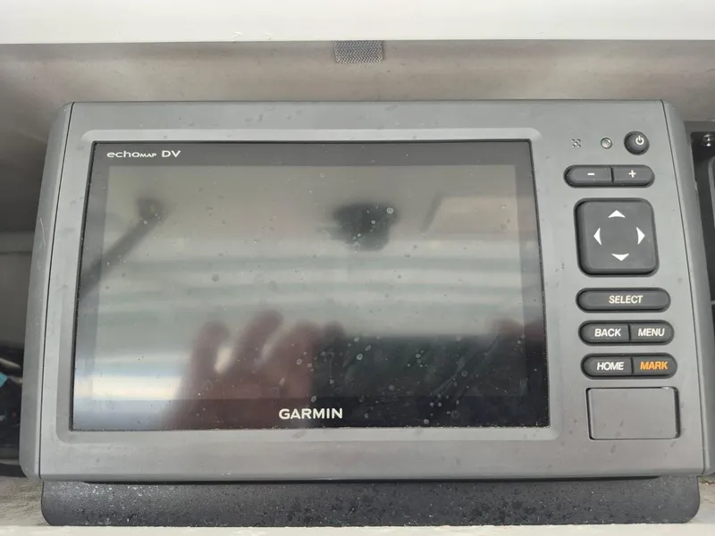 Slide: The Image of Garmin echoMAP DV on 1982 Bertram 38 Convertible boat dashboard. - 35