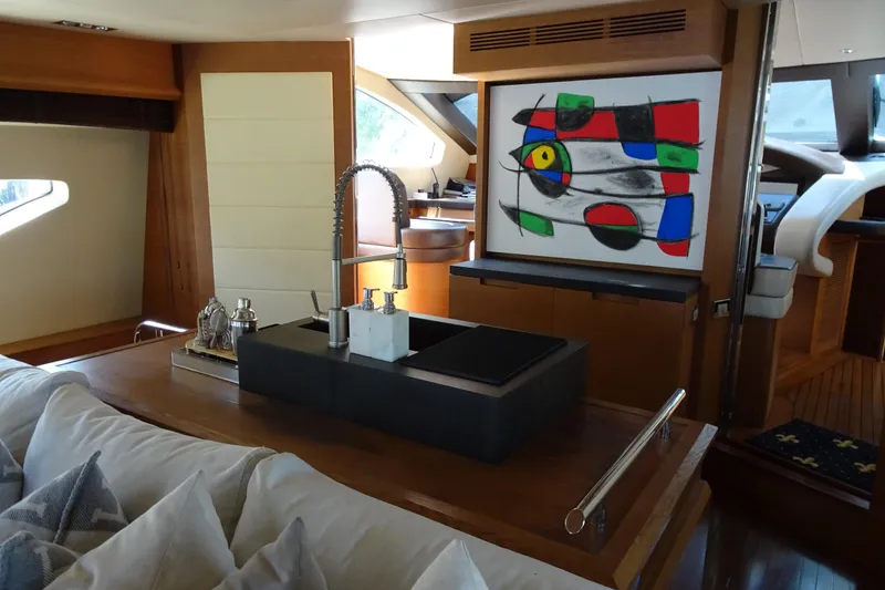 Slide: The Image of Luxurious interior of 2010 Azimut 100 Leonardo yacht with modern decor and spiral staircase. - 20