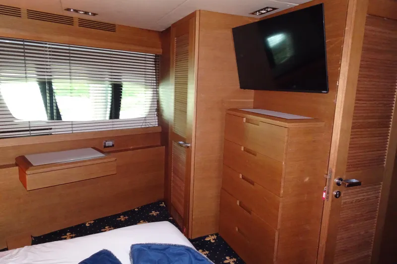 Slide: The Image of Luxurious interior of 2010 Azimut 100 Leonardo yacht with wooden finishes and modern design. - 36