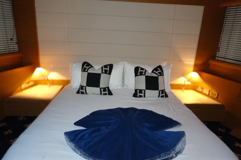 Slide: The Image of Luxurious bathroom in 2010 Azimut 100 Leonardo yacht with modern fixtures and elegant wood paneling. - 38