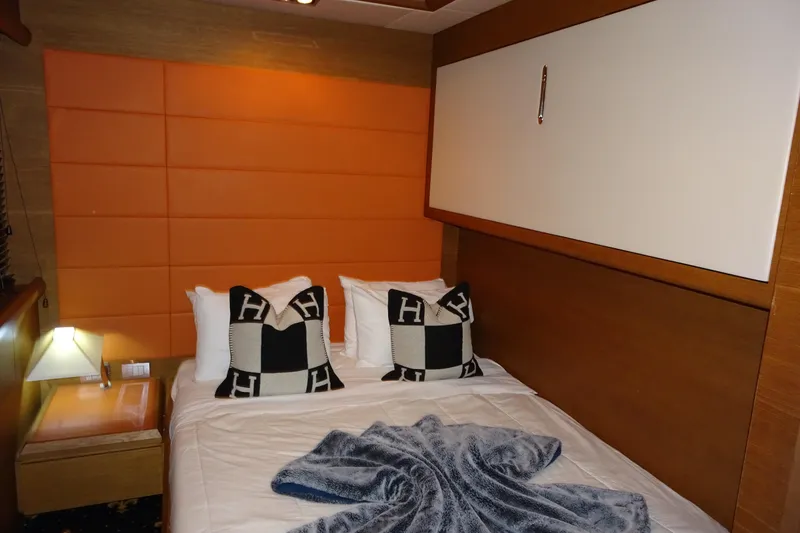 Slide: The Image of Luxurious cabin interior of 2010 Azimut 100 Leonardo yacht with wood paneling and TV. - 41