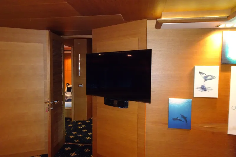 Slide: The Image of Luxurious bedroom interior on 2010 Azimut 100 Leonardo yacht with orange accents and cozy bedding. - 46