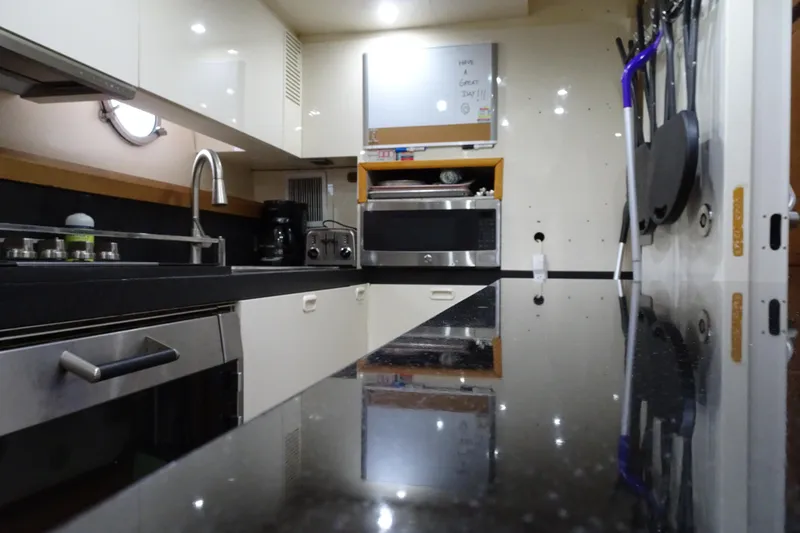 Slide: The Image of Stacked washer and dryer inside 2010 Azimut 100 Leonardo yacht. - 62