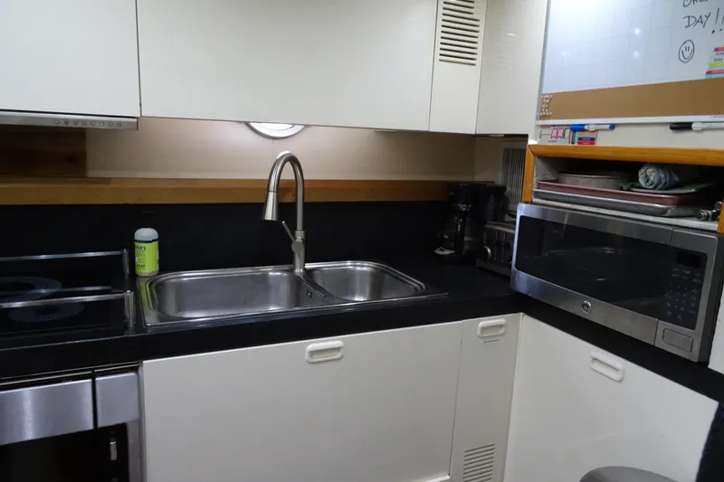 Slide: The Image of Engine room of 2010 Azimut 100 Leonardo yacht, featuring dual polished engines. - 63