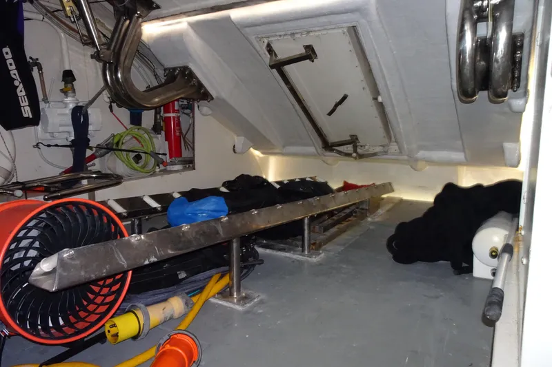 Slide: The Image of Engine room of a 2010 Azimut 100 Leonardo yacht, showcasing polished components. - 64