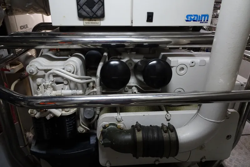 Slide: The Image of Engine room of 2010 Azimut 100 Leonardo yacht with pipes, ventilation, and fire extinguisher. - 66