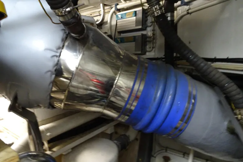 Slide: The Image of Engine room of 2010 Azimut 100 Leonardo yacht with visible pipes and machinery. - 71