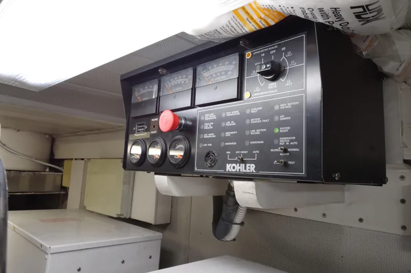 Slide: The Image of Engine room of 2010 Azimut 100 Leonardo yacht, showcasing complex machinery and wiring. - 75