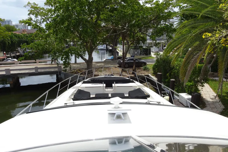 Slide: The Image of Luxurious 2010 Azimut 100 Leonardo yacht deck with covered seating and dining area. - 88