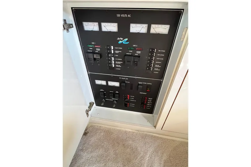 Slide: The Image of Electrical control panel of a 1997 Sea Ray 420 Aft Cabin boat. - 43