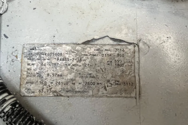 Slide: The Image of Metal identification plate on a 1997 Sea Ray 420 Aft Cabin boat. - 54