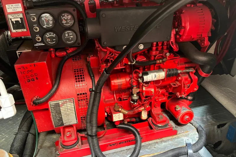 Slide: The Image of Red Westerbeke generator in 1997 Sea Ray 420 Aft Cabin yacht engine room. - 58