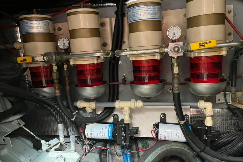 Slide: The Image of Engine room of 1997 Sea Ray 420 Aft Cabin with fuel filters and gauges. - 60