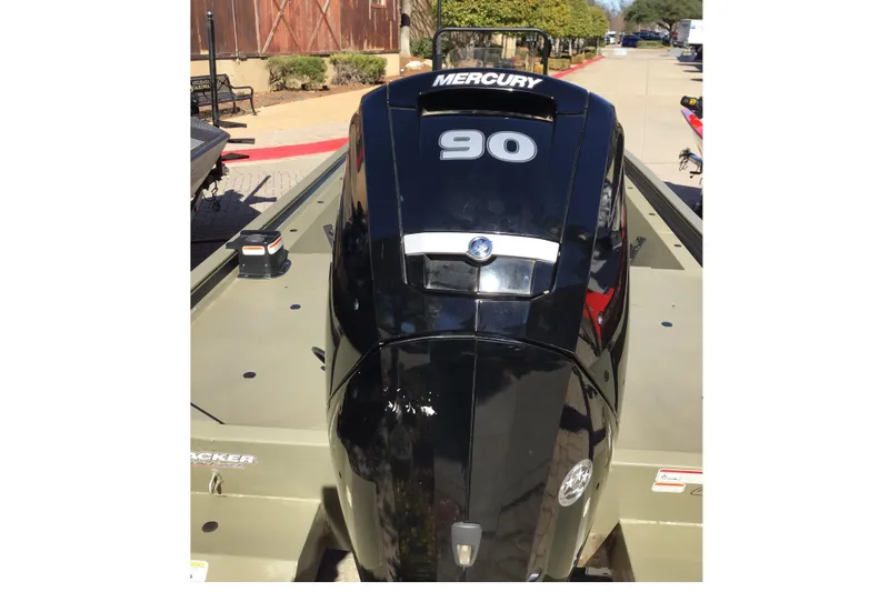 Slide: The Image of 2023 Tracker Grizzly 1860 CC boat with Mercury 90 engine, outdoor display. - 4