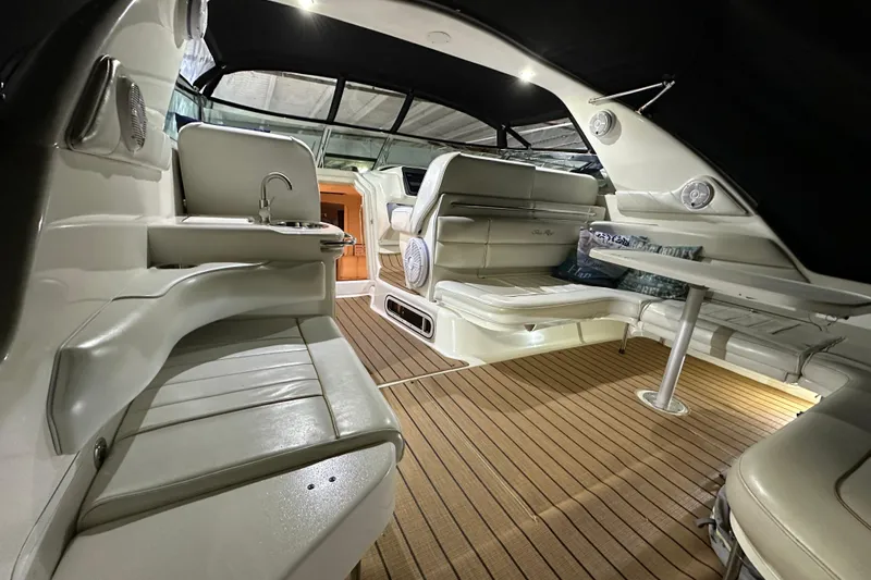 Slide: The Image of Luxurious interior of 1997 Sea Ray Sundancer 370 yacht with seating and table. - 10