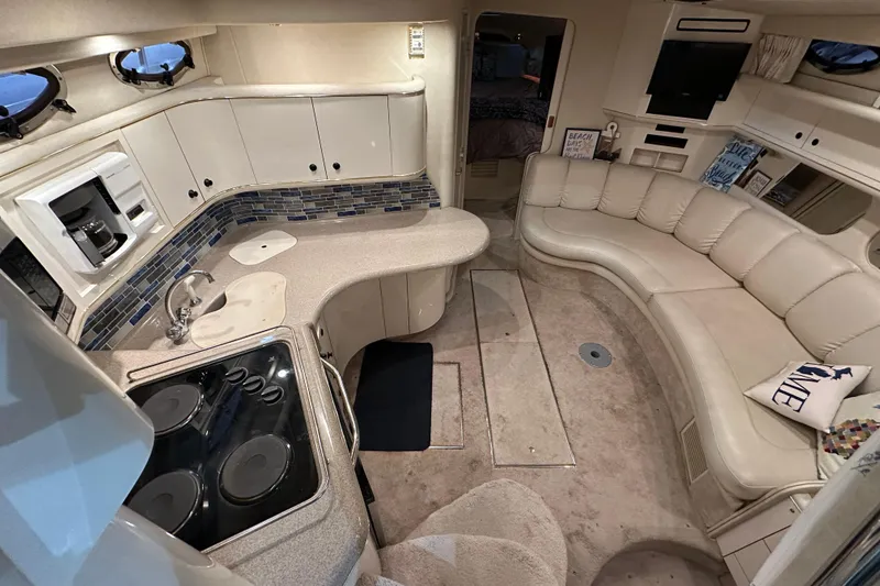 Slide: The Image of Luxurious interior of a 1997 Sea Ray Sundancer 370 yacht with modern amenities. - 18