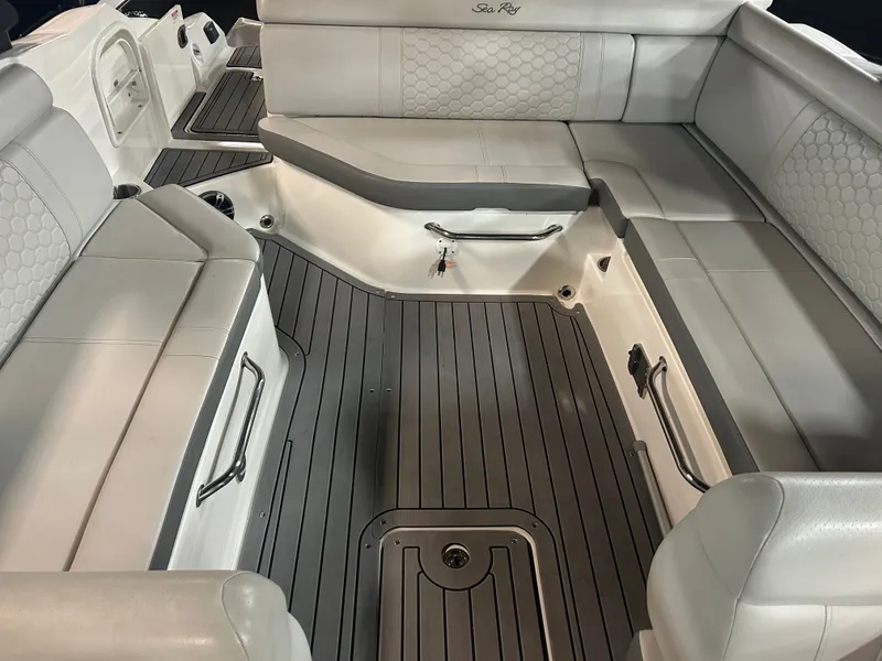 Slide: The Image of Interior of a 2021 Sea Ray SDX 270 boat with gray seating. - 14