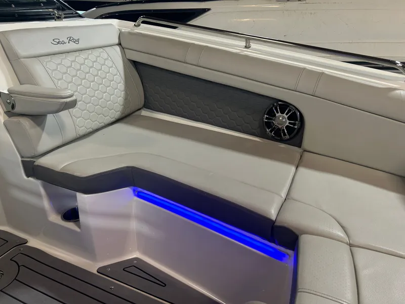 Slide: The Image of Interior of Sea Ray SDX 270 boat, 2021 model, featuring blue LED lighting. - 23