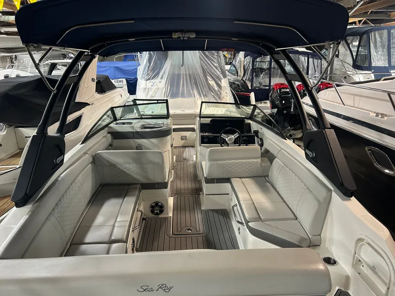 Slide: The Image of Interior view of a 2021 Sea Ray SDX 270 boat in showroom. - 27