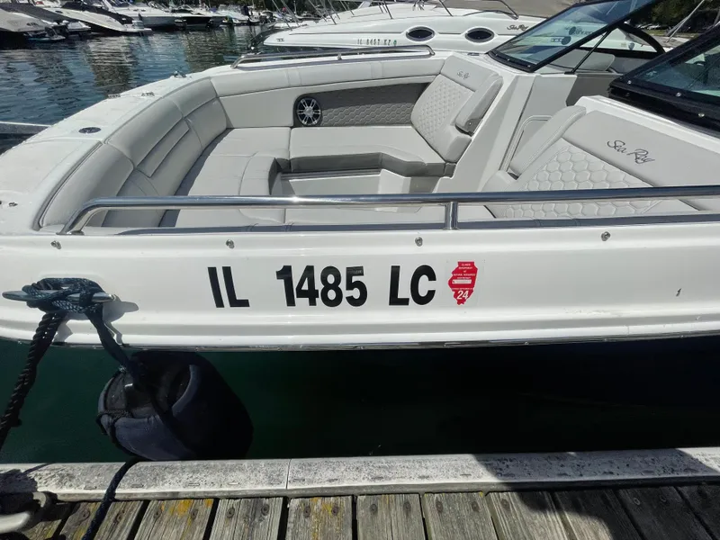 Slide: The Image of 2021 Sea Ray SDX 270 boat docked at marina. - 6