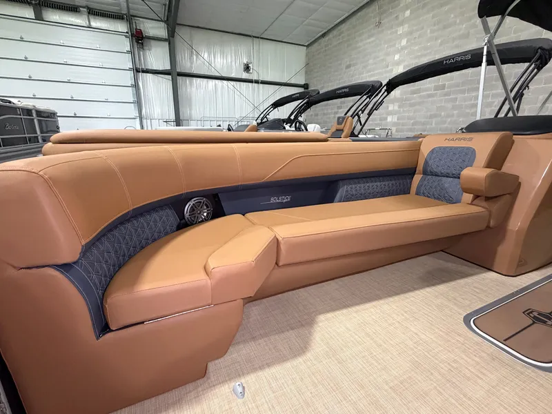 Slide: The Image of Interior of a 2026 Harris Solstice 250 with sleek leather seating and modern design. - 16
