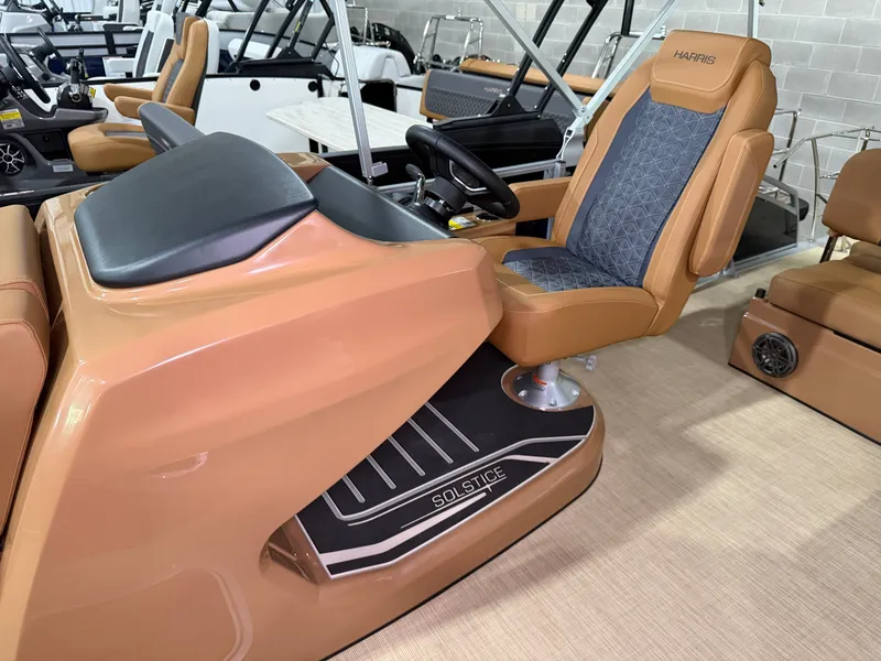 Slide: The Image of The image shows the helm of a 2026 Harris Solstice 250 with a sleek, modern design. - 34