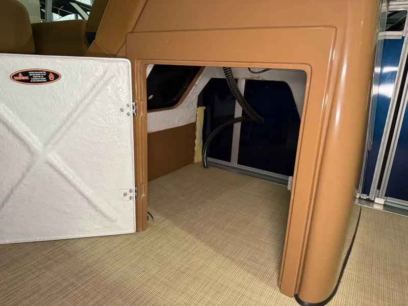 Slide: The Image of Interior view of a Harris Solstice 250 with storage space and cables. - 31