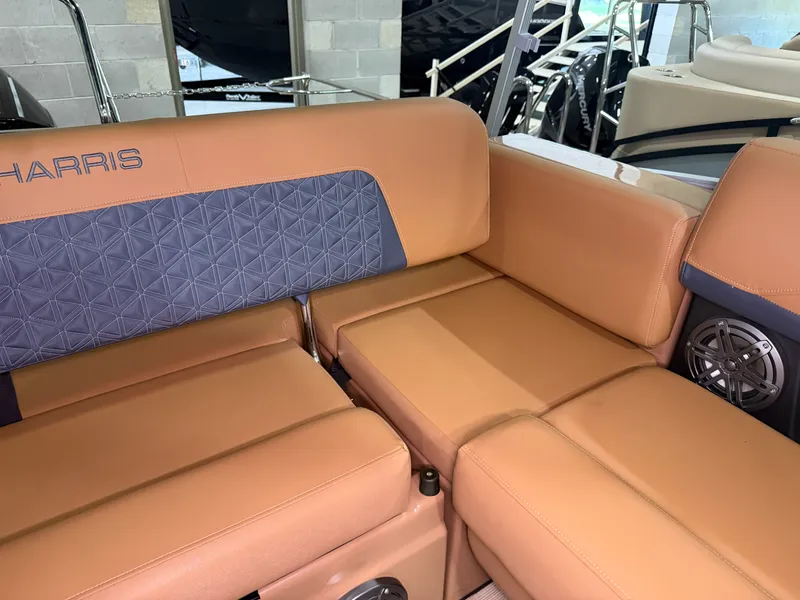 Slide: The Image of The 2026 Harris Solstice 250 features luxurious, cushioned seating with a modern design. - 49
