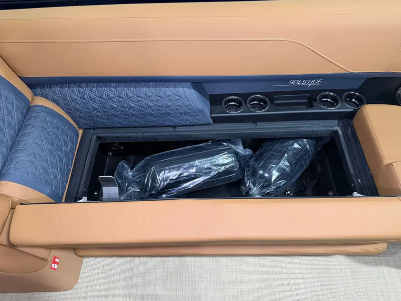 Slide: The Image of Interior of the Harris Solstice 250 with storage under the seats. - 22