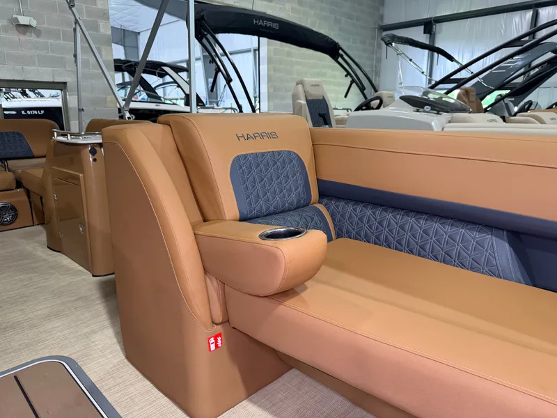 Slide: The Image of Interior of a 2026 Harris Solstice 250 with luxurious leather seating and modern design. - 23