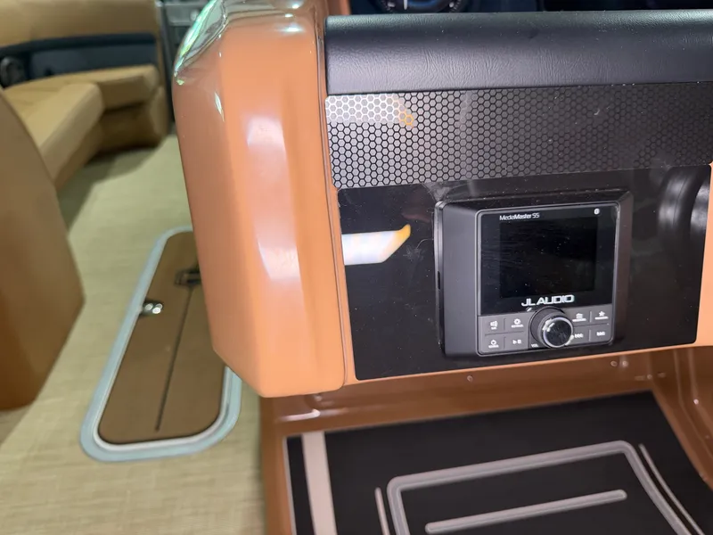 Slide: The Image of Interior view of a Harris Solstice 250 featuring a JL Audio system. - 37