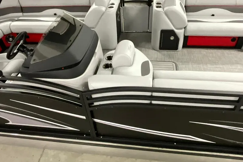 Slide: The Image of 2026 JC NEPTOON SPORT 21TT boat interior with sleek seating and modern dashboard design. - 12
