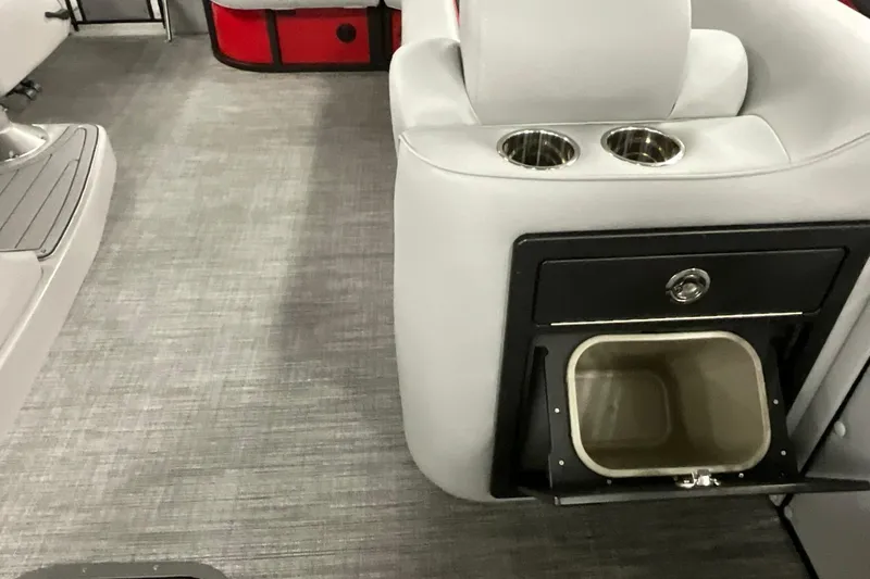 Slide: The Image of Interior of 2026 JC NEPTOON SPORT 21TT boat with cup holders and storage compartment. - 18