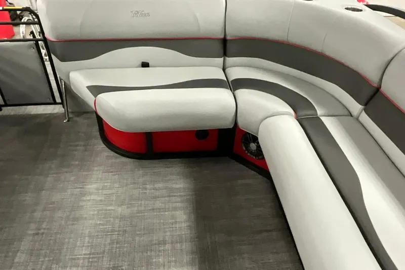 Slide: The Image of 2026 JC NEPTOON SPORT 21TT boat interior with gray and red cushioned seating. - 19