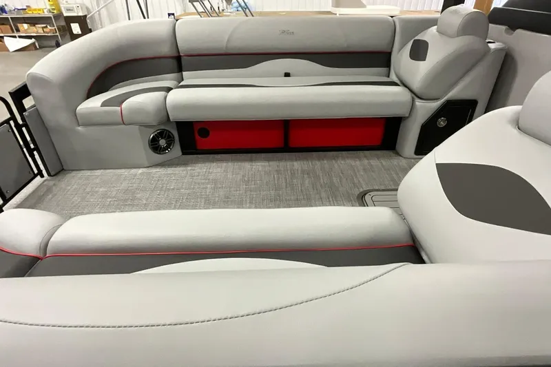 Slide: The Image of 2026 JC NEPTOON SPORT 21TT boat interior with gray and red seating, modern design. - 4