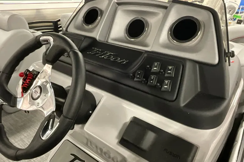 Slide: The Image of Steering console of 2026 JC NEPTOON SPORT 21TT boat with control switches. - 7